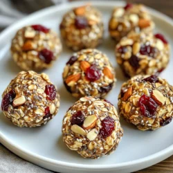 - 1 cup rolled oats - 1/2 cup almond butter - 1/2 cup honey or maple syrup - 1/2 cup dried cranberries, finely chopped - 1/4 cup almonds, roughly chopped - 1/4 cup chia seeds - 1 teaspoon pure vanilla extract - A pinch of sea salt You can switch almond butter for other nut butters. Peanut or sunflower butter works too. For sweeteners, you can use agave syrup or coconut sugar. Each sweetener gives a different taste. Want to mix it up? Try adding chocolate chips, shredded coconut, or even seeds like pumpkin or sunflower. These extras can make your bites even better! {{ingredient_image_2}} 1. In a large bowl, combine your rolled oats, almond butter, and honey or maple syrup. Mix well until the dough is sticky. 2. Next, add in the finely chopped dried cranberries, roughly chopped almonds, chia seeds, vanilla extract, and a pinch of sea salt. Stir until everything is well mixed. 3. If the mixture feels too sticky, let it sit for a few minutes. This helps it thicken. You can also add more oats if needed. 1. To shape the bites, wet your hands slightly. This makes it easier to handle the sticky mixture. 2. Roll the mixture into small balls, about 1 inch in size. Keep them uniform to have even servings. 1. Place the energy bites on a lined baking sheet. Make sure they have space between them. 2. Refrigerate for at least 30 minutes. This helps the bites firm up and hold their shape. To get the best texture for your energy bites, you can adjust the mixture easily. If your mix feels too sticky, let it rest for a few minutes. This helps it thicken. If it still feels too wet, add more rolled oats. Start with a tablespoon at a time. Mix well until you reach the right consistency. You want a dough that holds together but is not too dry. Serving your energy bites in a fun way can make them more appealing. Use a clear glass jar to show off the bites. You can also arrange them on a nice plate. For added flair, scatter whole almonds and dried cranberries around the bites. This splash of color makes your dish pop. It attracts the eye and adds texture. These energy bites pack a punch of nutrition. Rolled oats provide fiber, which keeps you full longer. Almond butter offers healthy fats and protein. Dried cranberries add vitamins and antioxidants. Chia seeds are rich in omega-3 fatty acids. Together, these ingredients provide lasting energy. Enjoying these bites can help boost your day. Pro Tips Chill Before Rolling: For easier handling, refrigerate the mixture for about 10 minutes before rolling into balls. This helps to firm up the mixture and makes it less sticky. Customize Your Mix-Ins: Feel free to swap out the cranberries and almonds for your favorite dried fruits or nuts. This recipe is versatile, so get creative! Perfect Portioning: Use a cookie scoop or tablespoon to measure out the mixture for uniform energy bites. This ensures even size and consistent nutrition per bite. Store for Freshness: Keep the energy bites in an airtight container in the refrigerator. For longer storage, consider freezing them, which can extend their shelf life up to three months. {{image_4}} You can change the taste of your energy bites easily. Adding spices like cinnamon or nutmeg gives warmth and depth. Just a pinch can transform the flavor. You can also try different dried fruits. Chopped apricots or raisins work well. Mixing in various nuts adds crunch. Walnuts or pecans are great options too. This way, you can make each batch unique! If you're vegan, swap honey for maple syrup. It keeps the sweetness while staying plant-based. For gluten-free needs, ensure your oats are certified gluten-free. You can also make nut-free bites. Use sunflower seed butter or pumpkin seed butter instead of almond butter. These swaps keep the bites tasty and safe for everyone. You can make your energy bites any size you want. For mini bites, roll smaller balls, about half an inch wide. These are perfect for little hands or snacks on the go. If you want larger bites, aim for 1.5 inches. Just remember, larger bites may need a bit more time in the fridge to set. Aim for about 1-2 bites per serving, based on your hunger and activity level! Store your energy bites in an airtight container. This helps keep them fresh. You can use glass jars or plastic containers. Make sure the lid fits tight to block air. If the bites feel sticky, add a bit more oats. This can help if they become too soft. These energy bites last about one week in the refrigerator. They are perfect for a quick snack! If you want to keep them longer, freeze them. Wrap each bite in plastic wrap before freezing. This way, you can grab one anytime. Check for a change in smell or color. If they smell sour or look off, toss them out. Also, if they feel very hard or dry, they may have gone bad. To extend shelf life, keep the bites away from heat and light. Always store them in the fridge or freezer for best results. Cranberry Almond Energy Bites are small, nutritious snacks. They mix oats, almond butter, and honey. I created this recipe for quick energy on busy days. They are easy to make and delicious to eat. Each bite packs a punch of flavor and nutrition. Kids and adults love them alike. You can enjoy them after school or as a quick breakfast. Absolutely! You can swap almond butter for peanut or sunflower seed butter. If you prefer a different sweetener, maple syrup works well too. Feel free to add chocolate chips or coconut for an extra treat. You can also change the nuts or fruits to match your taste. This recipe is flexible, so get creative! Yes, they are packed with nutrients. Rolled oats give you fiber and energy. Almonds add healthy fats and protein. Chia seeds are great for omega-3s and antioxidants. Dried cranberries offer vitamins and a touch of sweetness. Just watch the added sugar if you use more honey or syrup. Overall, these bites make a healthy snack choice. These cranberry almond energy bites are simple to make and full of goodness. We discussed required and optional ingredients, plus steps to mix and chill them. I shared tips for texture, presentation, and health benefits, showing their versatility for various diets. Energy bites can fit any preference or need. Enjoy experimenting with flavors and servings. Store them well to keep them fresh. These bites not only taste good, but they also boost energy. Try making them your own, and enjoy a tasty treat that fuels your day!